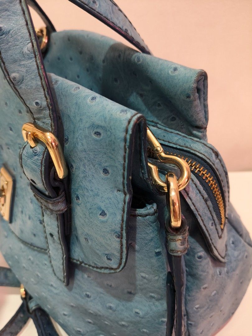 Turquoise Ostrich Leather Handbag with Gold Hardware (Category: Luxury Bags & Wallets) located in Davao. Submitted by caterinem07621 (Listing ID 1461129708, Image 3). Description: Chic turquoise handbag with ostrich texture and gold hardware. Features top handles, a detachable strap, and secure turn-lock and zipper closures. Perfect for day or night. In perfect condition 10/10 💯 guaranteed original from U.S rare model 🌻2,000 only ‼️.