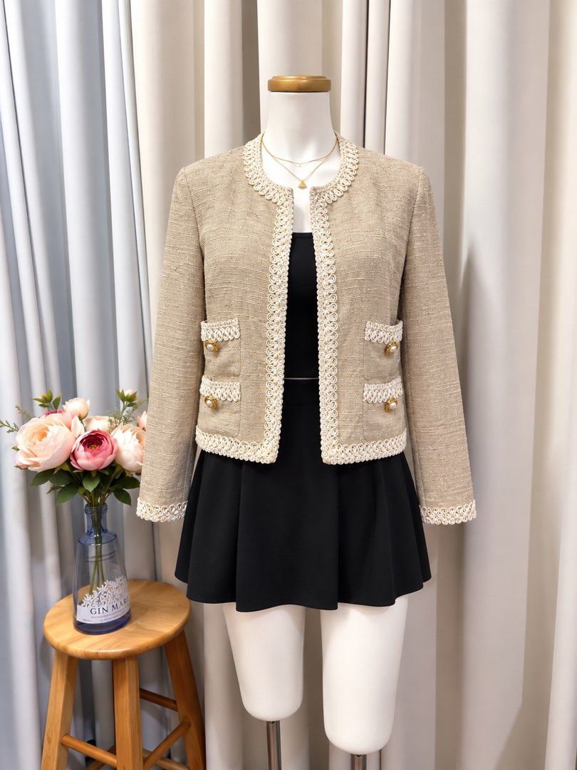 Tweed Deep Brown Semi Cropped Blazer (Category: Coats, Jackets and Outerwear) located in Taguig. Submitted by vm.co (Listing ID 1461304465, Image 1). Description: Perfect for: • Corporate office wear • Business travel • Smart casual outfits • Rainy or cool weather • Capsule wardrobe • Everyday sophisticated styling Condition: Appears to be in very good preloved condition with no visible major stains, tears, or discoloration in the photo. A light 