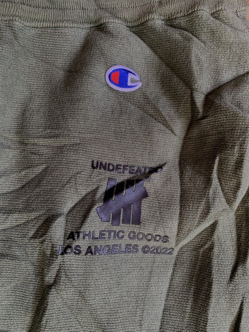 Undfted x Champion (Category: Joggers) located in Davao. Submitted by juliocesart1994 (Listing ID 1461121236, Image 2). Description: Champion x undefeated Authentic Size M on tag Fits 30 - 34 Length actual 38 10lq0 color rate and consition As new No issue P500+Sf .
