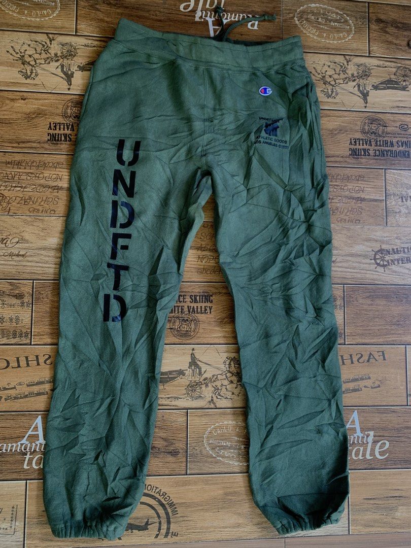 Undfted x Champion (Category: Joggers) located in Davao. Submitted by juliocesart1994 (Listing ID 1461121236, Image 1). Description: Champion x undefeated Authentic Size M on tag Fits 30 - 34 Length actual 38 10lq0 color rate and consition As new No issue P500+Sf .