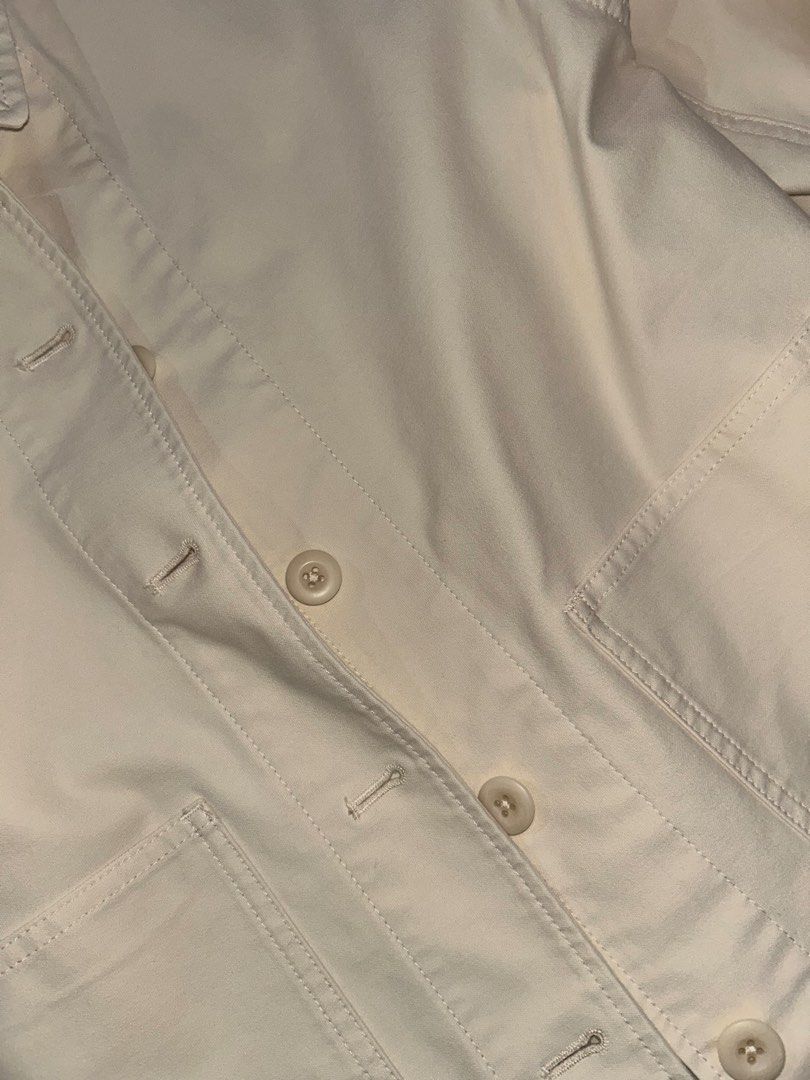 Uniqlo Cream Jersey Jacket (Category: Coats, Jackets and Outerwear) located in Cainta. Submitted by unboxingstuff (Listing ID 1461284764, Image 2). Description: - Cream colored utility/jersey jacket - Button front closure - Two front pockets - Collared neckline - Long sleeves with button cuffs - Classic workwear style - Great for layering - Size: L (can fit XL) .