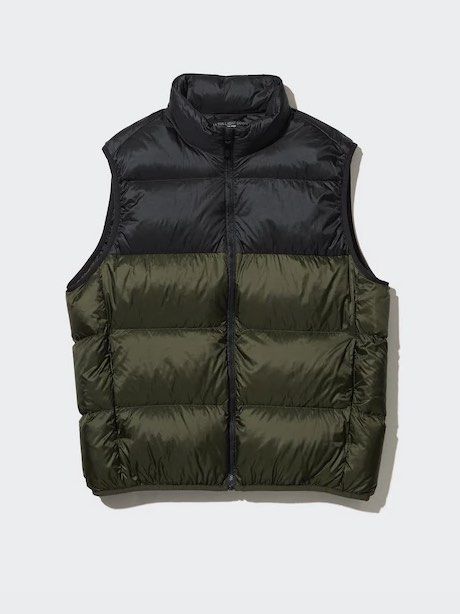 Uniqlo Kids Puffer Padded Warm Vest (Category: Coats, Jackets and Outerwear) located in Binan City. Submitted by myprelovedhaul (Listing ID 1461217708, Image 1). Description: Fits adult xs frame The item in the image is a Uniqlo Kids Light Warm Padded Puffer Vest. It features a distinctive two-tone colorblock design with a dark navy/black shoulder yoke paired with a bold red lower body..