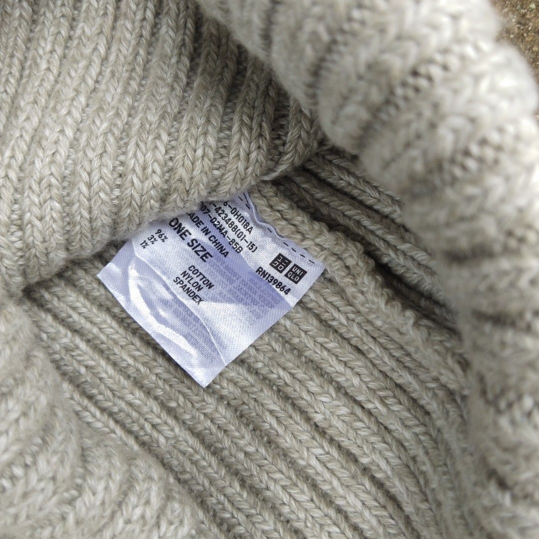 Uniqlo Ribbed Knit Beanie Hat (Category: Hats & Beanies) located in Tanza. Submitted by ThriftPieces (Listing ID 1461223761, Image 2). Description: - Brand: Uniqlo - Color: Light Grey - Material: Ribbed Knit (Cotton, Nylon, Spandex) - Size: One Size Fits Most - Features: Comfortable, simple design, great for everyday wear and keeping warm..