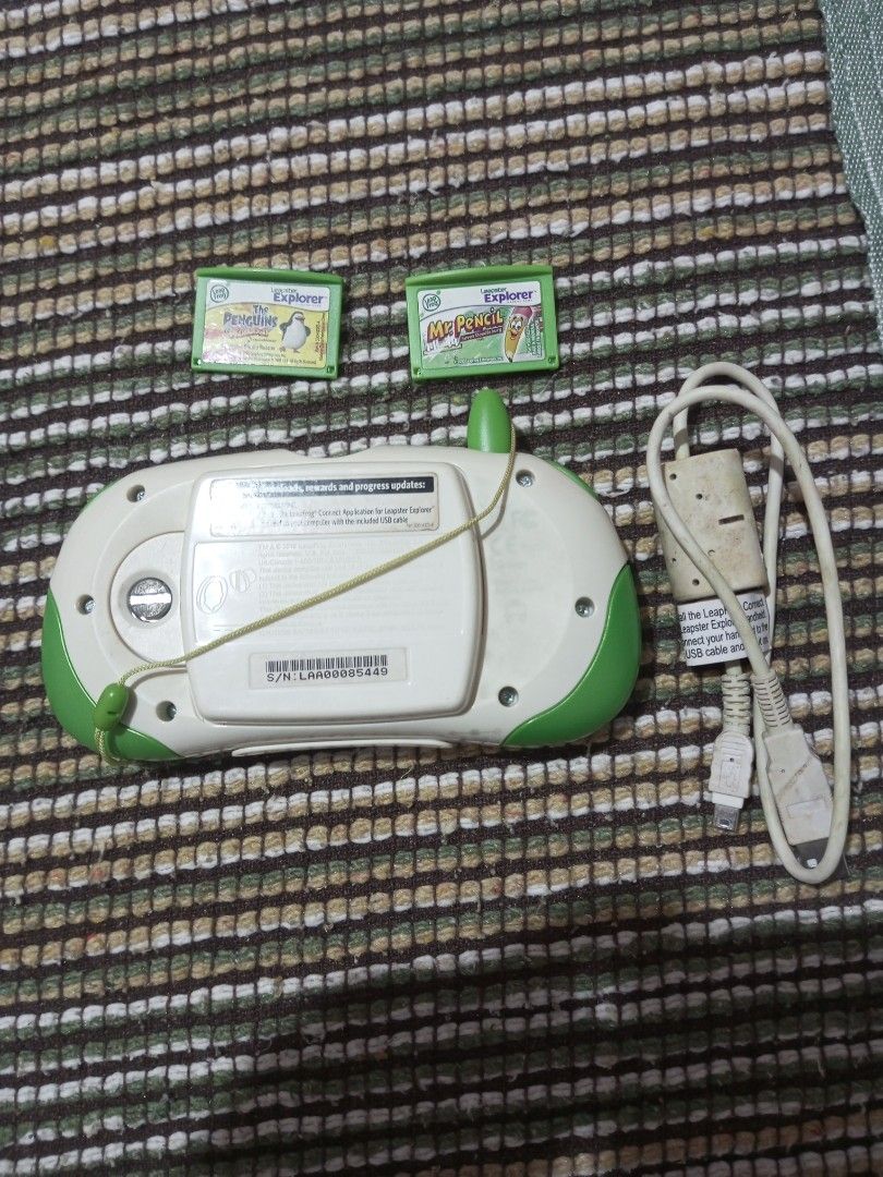 (Untested)LeapFrog Explorer Handheld Learning Game System with 2 Games (Category: Educational & Learning Toys) located in Caloocan City. Submitted by tobylacua26871 (Listing ID 1461248908, Image 2). Description: -(Untested get as is) - LeapFrog Explorer handheld learning system - Includes device, USB cable, and 2 game cartridges - Games included: 'Mr. Pencil' and 'Penguins' - Features interactive screen and buttons for engaging play - Perfect for