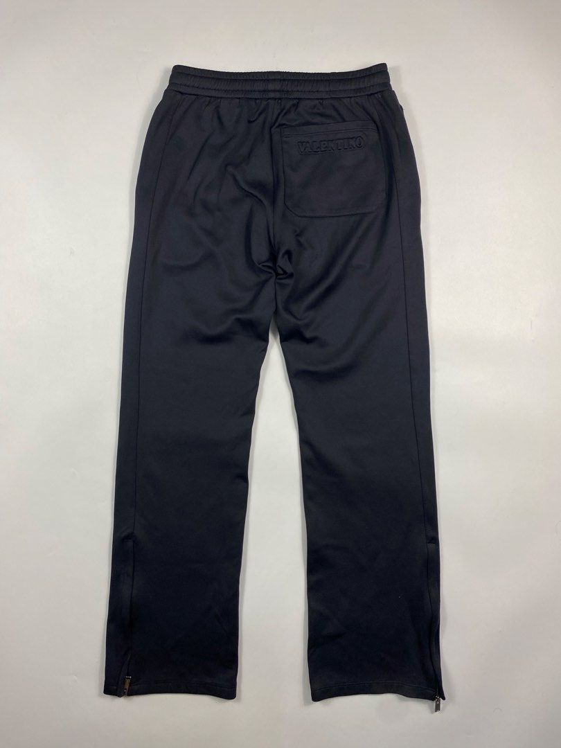 Valentino - Embossed Logo Sweatpants (Category: Trousers) located in San Miguel. Submitted by stylecycle. (Listing ID 1461313551, Image 1). Description: Valentino - Embossed Logo Sweatpants (Authentic) Tagged Size : XS Condition : 10/10 Made in : Italy Dimensions Waist - (28-30) Length - 38 Inseam - 27 Hem - 8 Condition : This item is used , Please don’t expect if it is like brand new. Measured : Laid Flat by Inches .