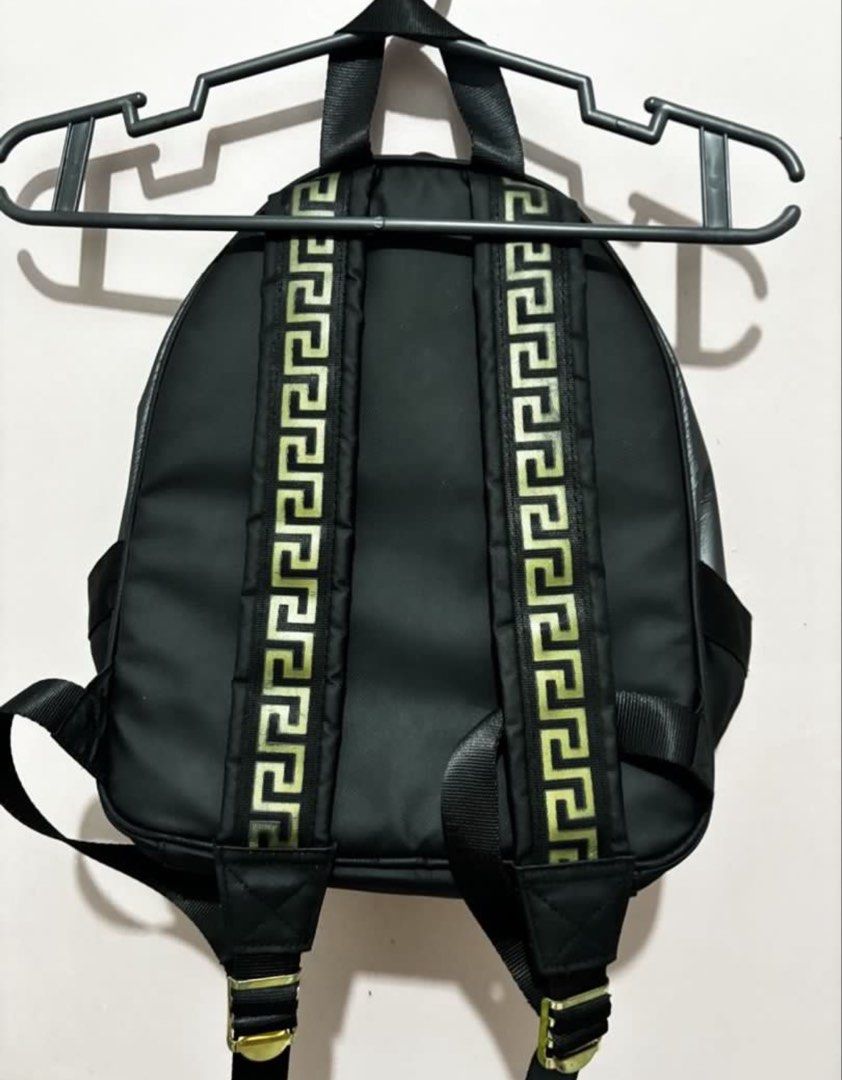 Versace Parfums Bright Crystal Backpack (Category: Luxury Bags & Wallets) located in Baguio. Submitted by declutter94 (Listing ID 1461249898, Image 2). Description: Well-used but still in usable condition. Has minor flaws/signs of use, so please manage expectations. 🤍 • Versace Bright Crystal design • Spacious and practical • Good for everyday use, school, or travel 📩 PM me for more photos and details. Can send close-up photos of the flaws upon