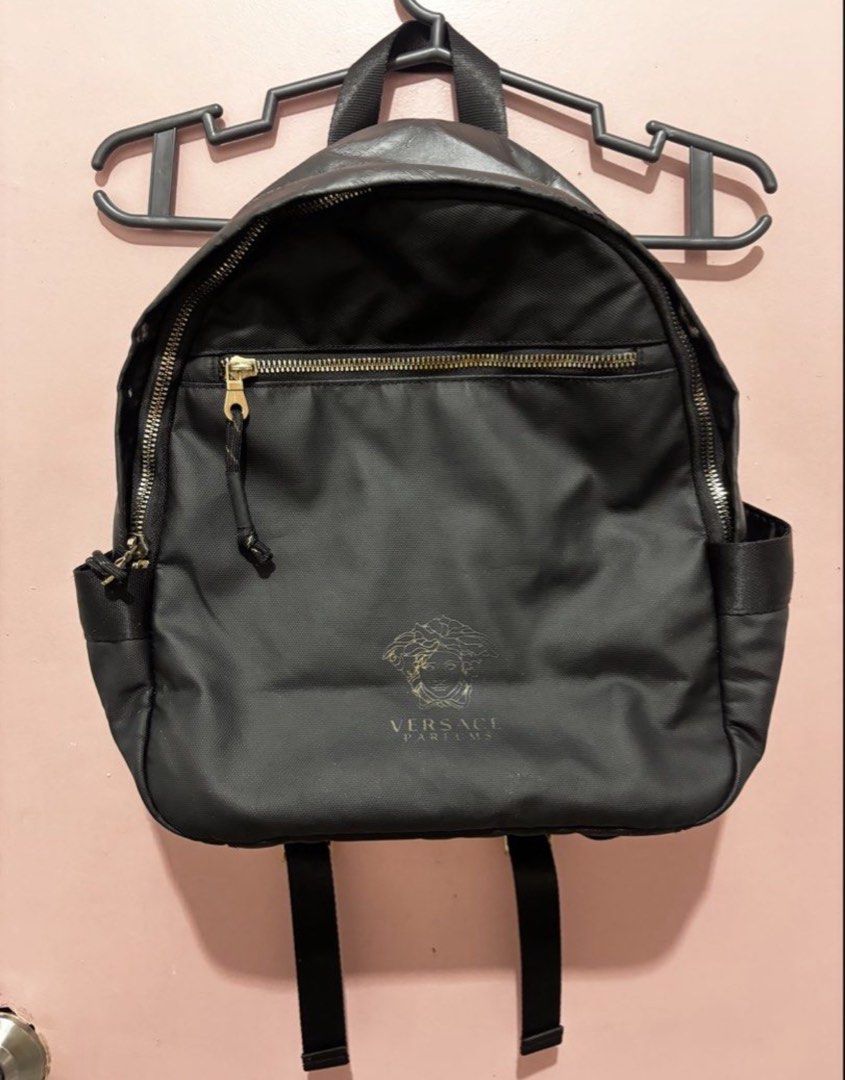 Versace Parfums Bright Crystal Backpack (Category: Luxury Bags & Wallets) located in Baguio. Submitted by declutter94 (Listing ID 1461249898, Image 1). Description: Well-used but still in usable condition. Has minor flaws/signs of use, so please manage expectations. 🤍 • Versace Bright Crystal design • Spacious and practical • Good for everyday use, school, or travel 📩 PM me for more photos and details. Can send close-up photos of the flaws upon