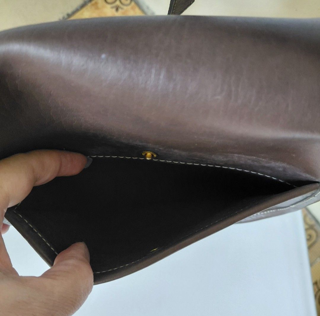 Via Demizon Crossbody Bag (Category: Cross-body Bags) located in Quezon City. Submitted by fiestypam (Listing ID 1461235148, Image 3). Description: - Classic brown leather crossbody bag - Secure flap closure with snap button - Adjustable strap for customized comfort - Interior pocket for essentials - Versatile and simple design for everyday use - slip pocket outside DF c/o buer.
