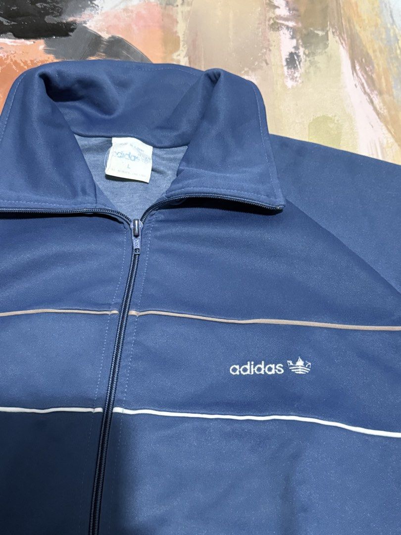 Vintage Adidas jacket (Category: Coats, Jackets and Outerwear) located in Las Pinas. Submitted by thrftmnl. (Listing ID 1461224388, Image 2). Description: Vintage Adidas Jacket Size: Large Dimes Width: 22.5 Length: 27 Issue: signs of usage.