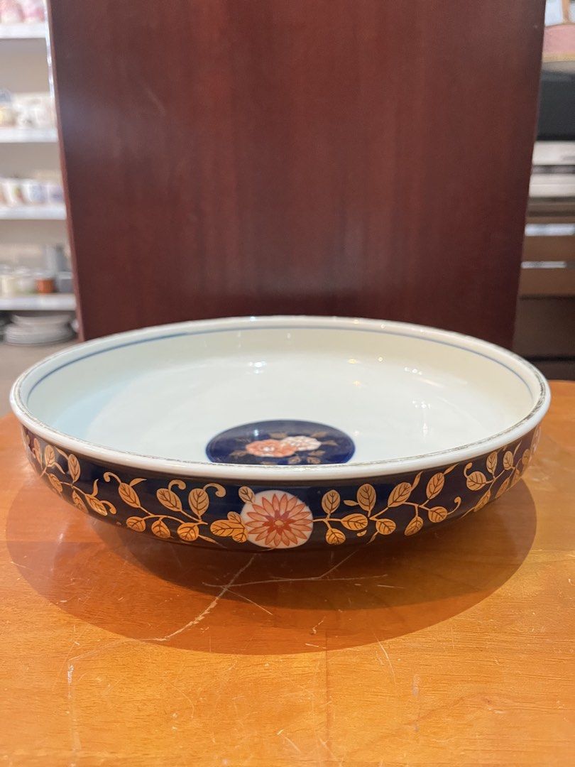 Vintage Hand Painted Arita Serving Dish (Category: Dinnerware & Cutlery) located in Calamba. Submitted by chebvintagedepot (Listing ID 1461216427, Image 3). Description: [B07-02] This vintage Japanese serving dish has a traditional Arita/Imari-style design with hand-painted floral and gold accents. The polychrome design give it a classic Japanese look, suitable for serving, display, or adding to a collection. Dimensions: 10 inches diameter Note: 