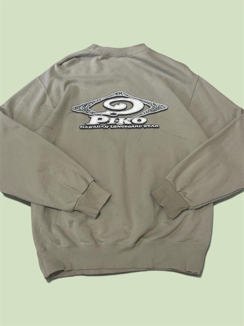 Vintage piko sweater (Category: Coats, Jackets and Outerwear) located in Cagayan de Oro. Submitted by charlessober (Listing ID 1461149628, Image 2). Description: - Tan Dako sweatshirt - Medium size (tag included) - Dako logo prominently displayed on the front - Larger Dako logo on the back - 'Hawaiian Longboard Wear' text detail - Ideal for casual and everyday wear.