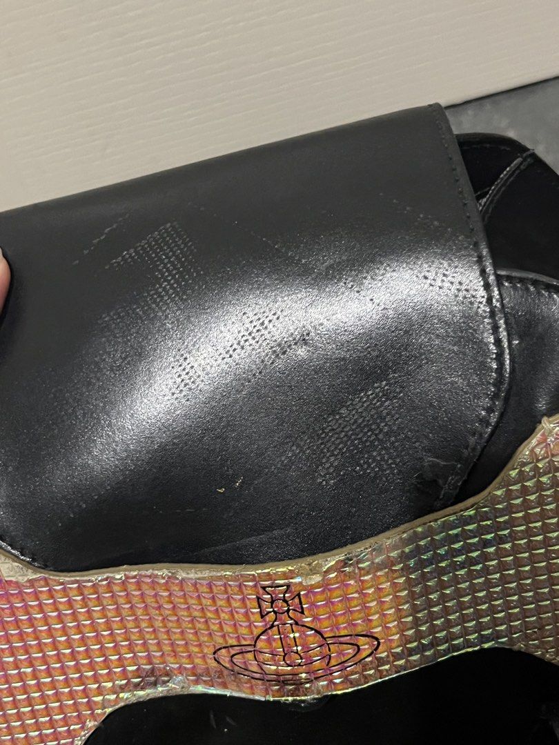 Vivienne Westwood Dogbone Bowling Bag (Category: Luxury Bags & Wallets) located in Baguio. Submitted by vintagegurlie (Listing ID 1461262539, Image 2). Description: Black leather material, very nice as a shoulder bag since long handles. Yes, it is good for work/school. All details posted First to pay.