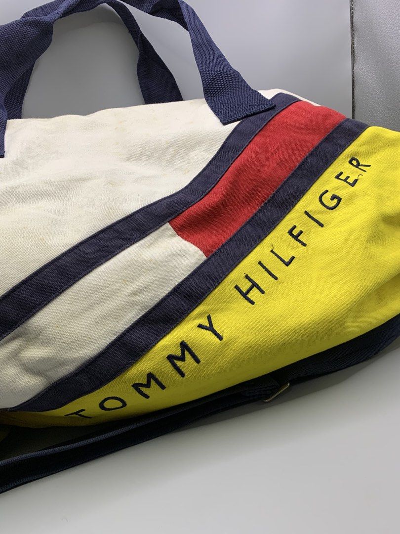VTG. TOMMY HILFIGER DUFFLE BAG (Category: Briefcases) located in Bulacan. Submitted by ridersthrift_ph (Listing ID 1461271106, Image 2). Description: Authentic TH Flaws - Stains and One Pin Hole - Sling Strap Replaced ( I Use Longchamp Sling) No Other Issue Sign of usage Gcash Payment Bulacan 📍 .