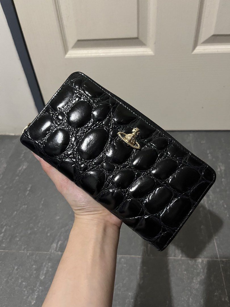 VW Patent Leather Embossed Long Wallet (Category: Luxury Bags & Wallets) located in Baguio. Submitted by vintagegurlie (Listing ID 1461263591, Image 1). Description: No issue. Clean interior. Not used. From the Piccola Pelletteria Line. This one is Japan Exclusive. First to pay Basis.