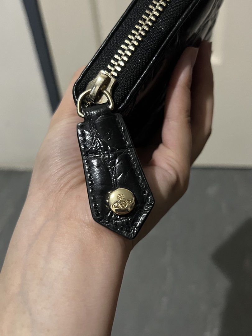 VW Patent Leather Embossed Long Wallet (Category: Luxury Bags & Wallets) located in Baguio. Submitted by vintagegurlie (Listing ID 1461263591, Image 3). Description: No issue. Clean interior. Not used. From the Piccola Pelletteria Line. This one is Japan Exclusive. First to pay Basis.