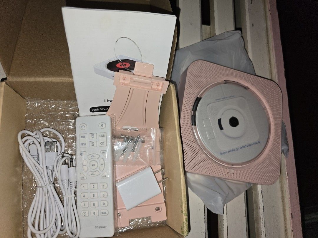 Wall Mountable CD Player (Pink) (Category: Portable Music Players) located in Tacloban City. Submitted by fangirlthinks11 (Listing ID 1460858192, Image 2). Description: Selling a wall mountable CD player. It's a compact unit designed to be hung on the wall. Great for playing your CDs. Comes in its original packaging. Rarely used. No damage. Color: PINK Price non negotiable. Shippong from Tacloban City via J&T. Shipping shouldered by buyer. DM if 