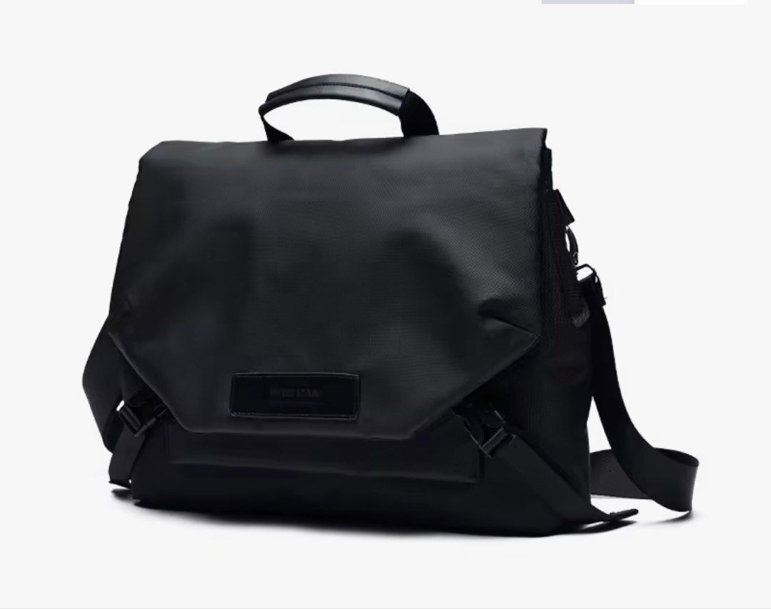 Waterproof Messenger Laptop Bag (Category: Sling Bags) located in Las Pinas. Submitted by albert_lp (Listing ID 1461242523, Image 1). Description: - FOUR MAN black messenger bag - Waterproof material - Internal computer filter layer - Ample space for books and laptop - Adjustable strap .