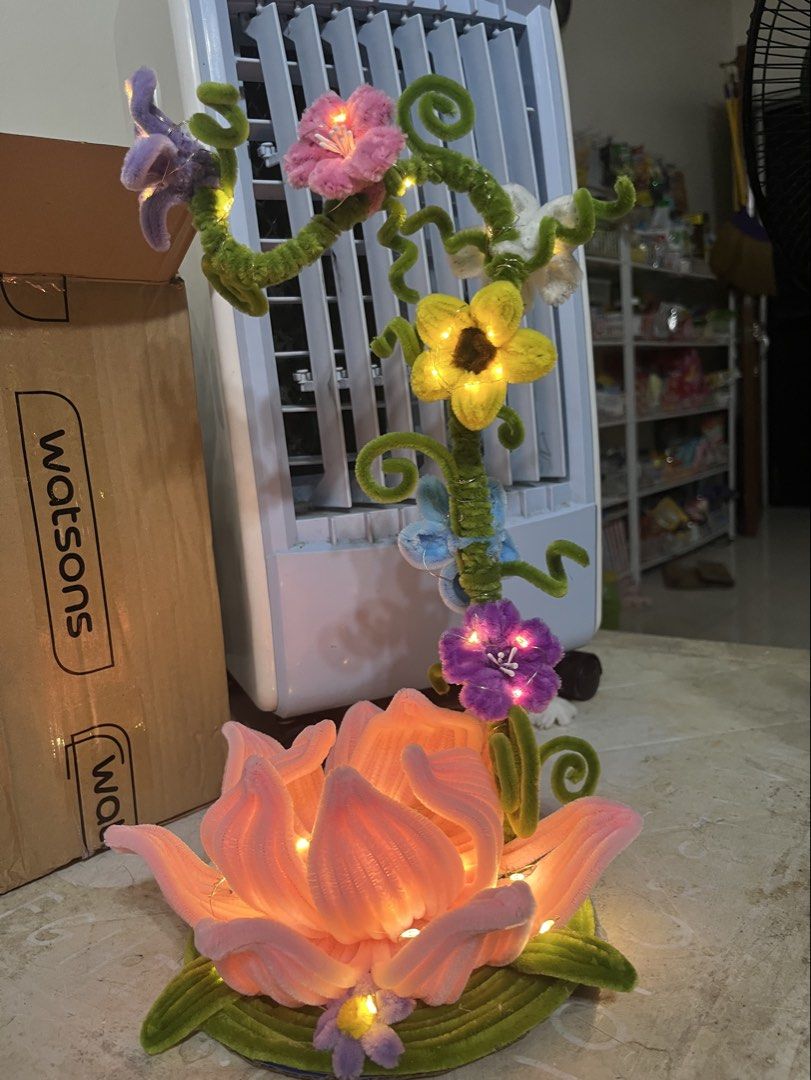 Whimsy flower lamp (Category: Handmade Craft) located in Manila. Submitted by rikhooo (Listing ID 1461318600, Image 3). Description: Whimsy flower lamp made from fuzzy wires/pipe cleaners. Made to order!💕 But would accept rush orders with price negotiations🥰 Lights are LED fairy lights but can be modified! .