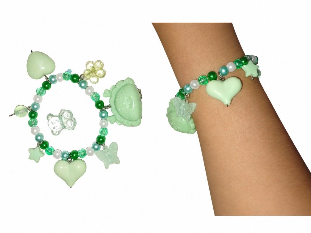 WHISPER OF NATURE (Category: Looking For) located in Pagadian. Submitted by richy2. (Listing ID 1461210254, Image 1). Description: 🌿 Whisper of Nature Whisper of Nature is a charming handmade bracelet inspired by the gentle beauty of nature. Its soft green, mint, white, and emerald beads create a fresh and calming appearance, while the heart, flower, butterfly, and star charms represent love, growth, freedom, and hope. Each small detail adds a p