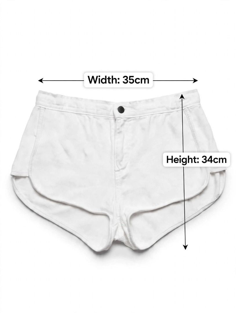 White Dolphin Shorts#75 (Category: Shorts) located in Caloocan City. Submitted by outfitloop (Listing ID 1461122110, Image 3). Description: - High-waisted fit - Button and zip closure - Comfortable for everyday wear IMPORTANT: • 1st photo is an AI styling/model preview for reference on how the item may look when worn. • Please refer to the actual photos for the item’s true appearance and condition. • Color may slightly vary due to lighting, camer