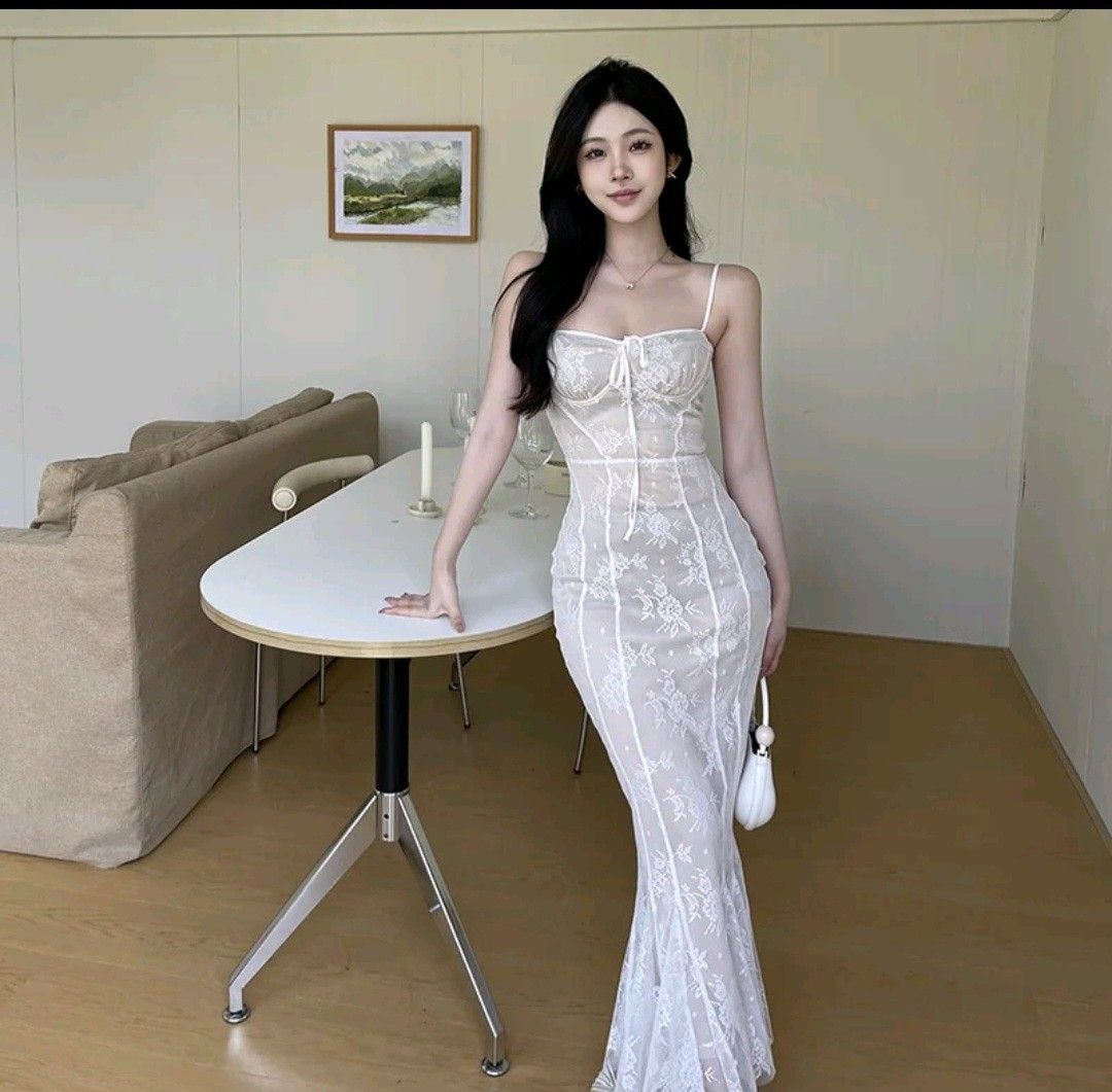 White Lace Maxi Dress with Spaghetti Straps (Category: Dresses) located in Manila. Submitted by chavezmade78698 (Listing ID 1461189369, Image 2). Description: - Beautiful white lace maxi dress - Delicate floral lace overlay - Spaghetti straps and sweetheart neckline - Ties at the front - Flattering mermaid hem with a slit - Ideal for special occasions or a night out.