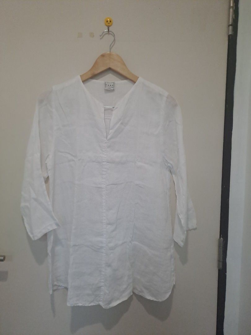 White Linen Tunic dress (Category: Longsleeves) located in Manila. Submitted by joanbalde39643 (Listing ID 1461231876, Image 1). Description: This garment is a women's white linen tunic blouse, featuring a relaxed fit, a split V-neckline, and versatile three-quarter length sleeves..