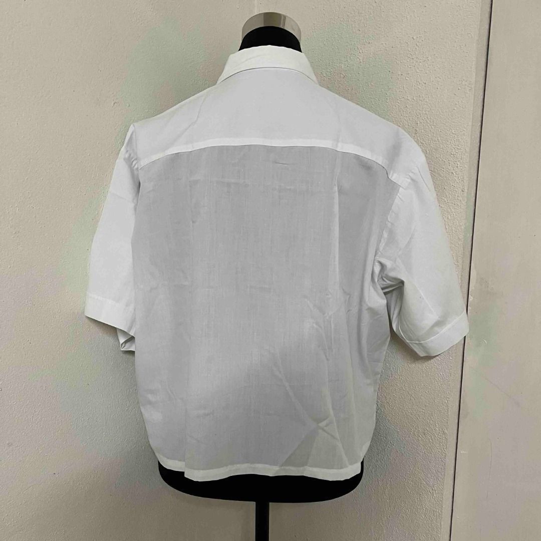 White Oversize Loose-Fit Button-Down Polo (Category: Blouses) located in Mabalacat. Submitted by keb-a (Listing ID 1461159462, Image 3). Description: 🍒 — large — b: 38~40" — w: 32~34" — l: 21" 🍒 — got this from a shop in chatuchak market that reworks tops — lightweight, breathable fabric — relaxed oversized silhouette for ultimate comfort — classic button-down front with collar — easy to layer or wear solo for a minimalist vibe 🍒 — rfs: declut