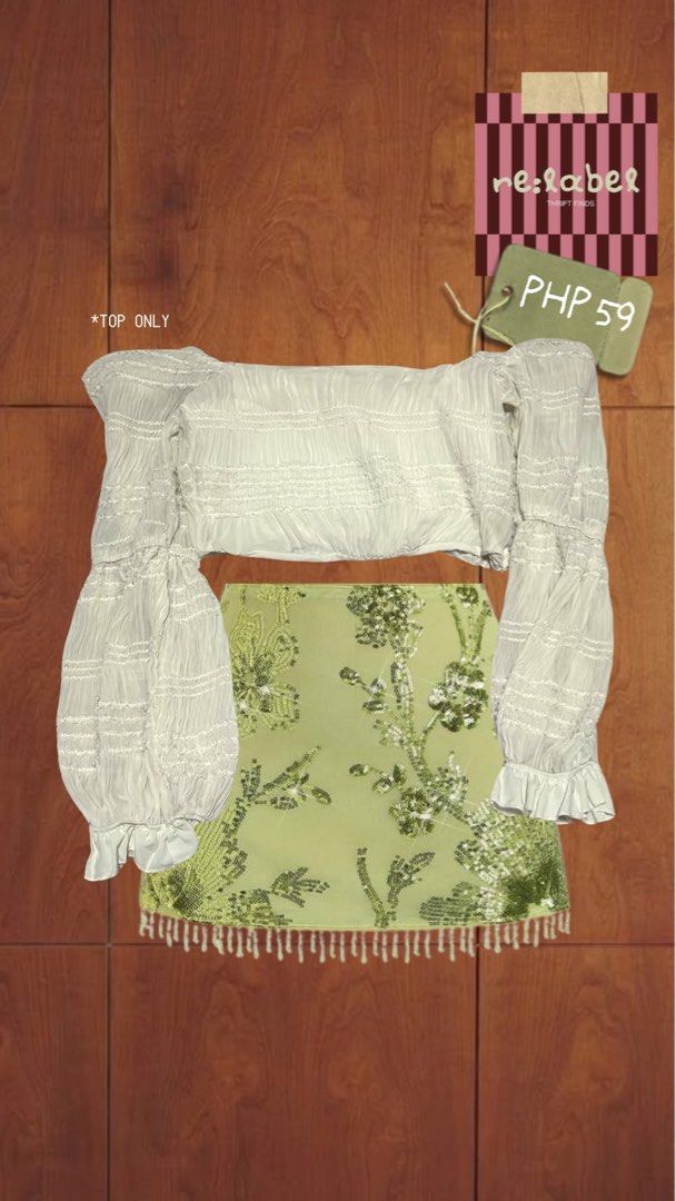 White Smocked Off-Shoulder Boho Top (Category: Blouses) located in Bacoor. Submitted by relabel (Listing ID 1461236349, Image 1). Description: - White off-shoulder crop top - Smocked detailing for a flattering fit - Voluminous puff sleeves with ruffled cuffs - Ideal for night outs or special occasions - Skirt not included.