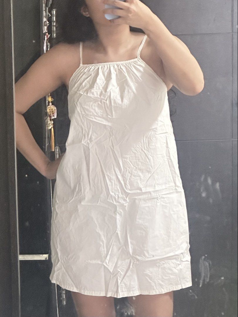 White Spaghetti Strap Balloon Mini Dress (Category: Dresses) located in Manila. Submitted by pachookie (Listing ID 1461133271, Image 1). Description: - Gathered neckline with adjustable strap - Falls above the knee - fits Small.