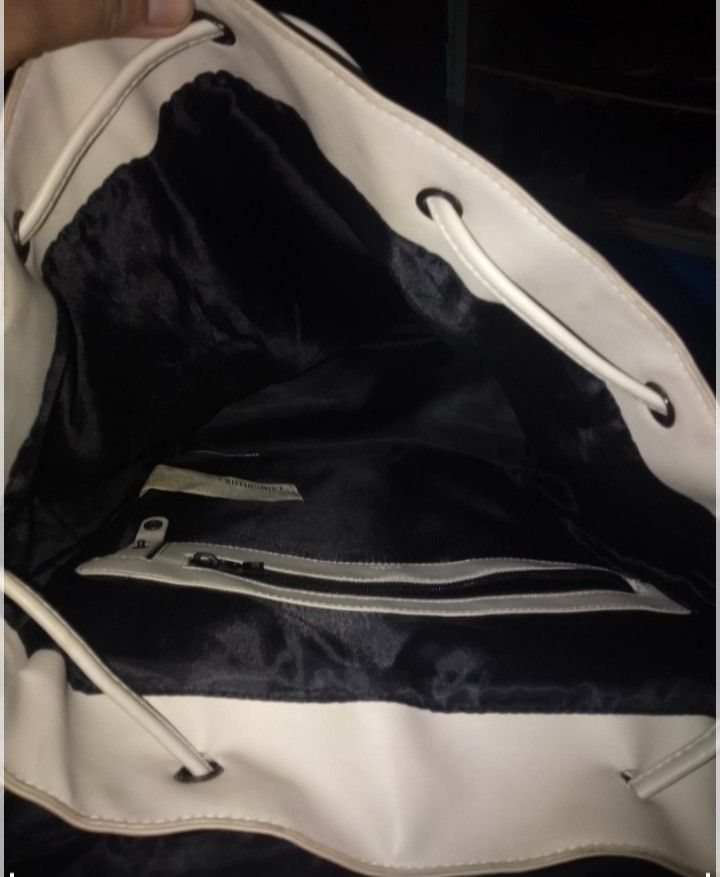 White Zara Backpack (Category: Backpacks) located in Manila. Submitted by jayzayne1824 (Listing ID 1461245790, Image 3). Description: - Stylish white backpack from Zara - Secure drawstring closure - Front pockets with decorative buckle details - Interior zippered pocket for essentials - Adjustable straps for comfortable wear - Ideal for everyday errands or your next getaway.