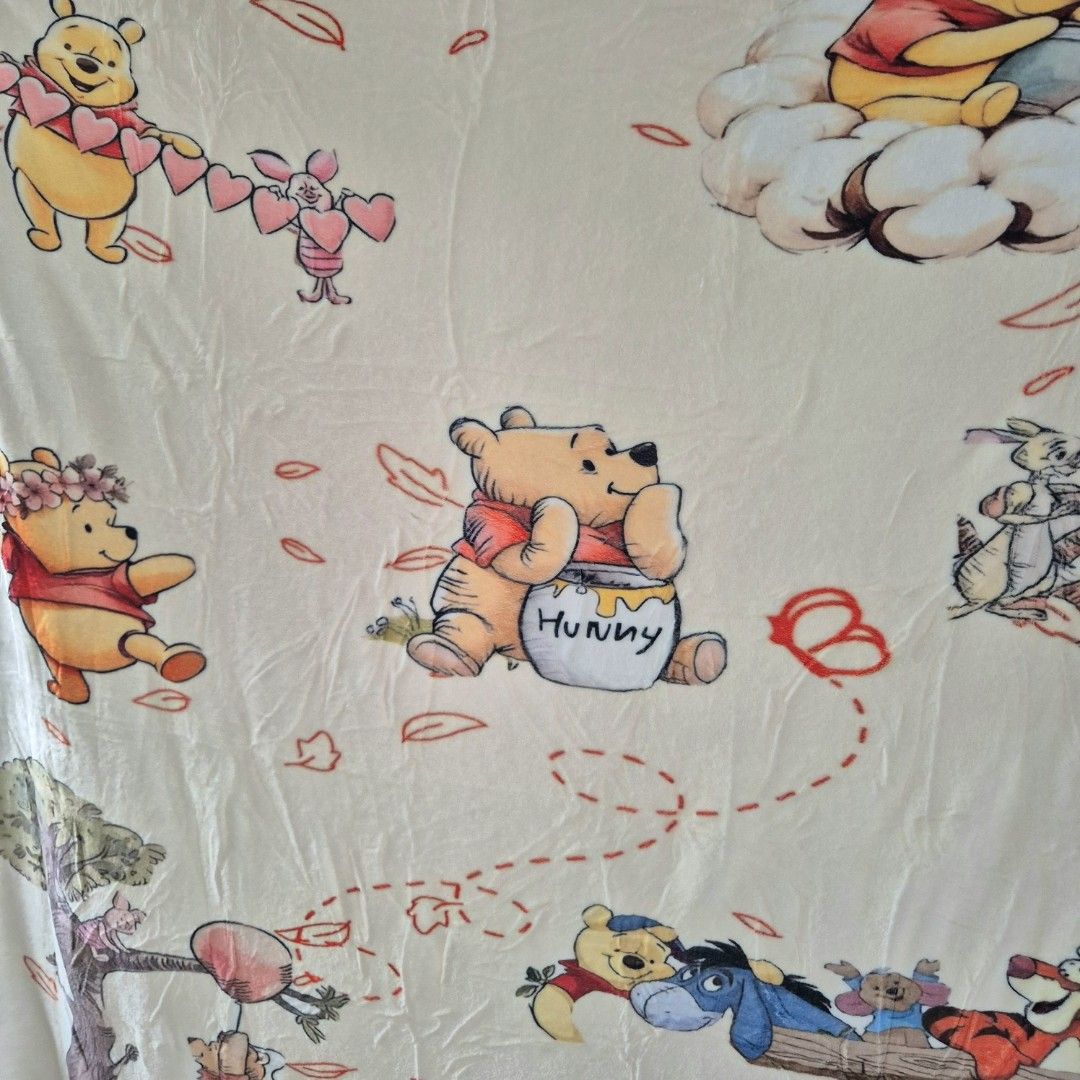 Winnie the pooh Fluffy blanket Single size (Category: Bedding & Towels) located in Makati City. Submitted by nkris07 (Listing ID 1461172929, Image 2). Description: Winnie the pooh fluffy soft blanket light cream colored super soft🤍 single size new.