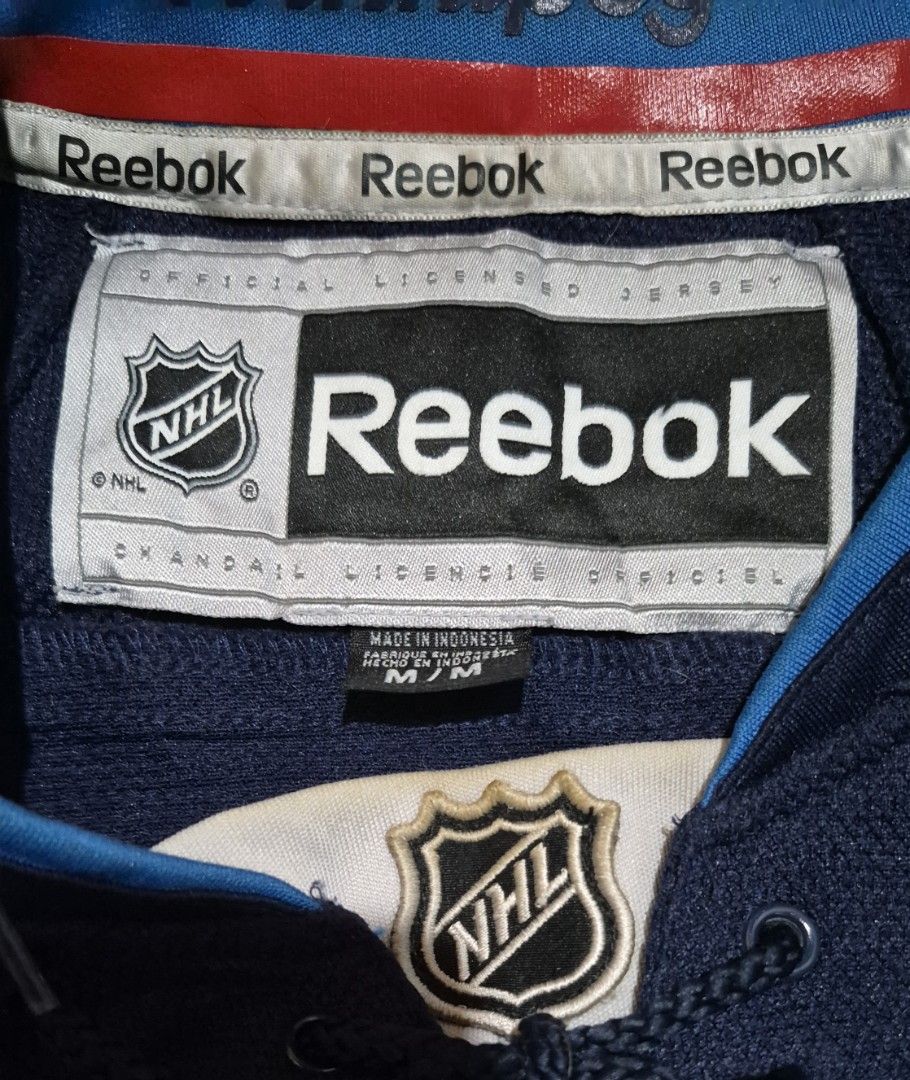 Winnipeg Jetz NHL Jersey (Category: Activewear) located in Noveleta. Submitted by nep21 (Listing ID 1461233801, Image 3). Description: Winnipeg Jetz NHL by Reebok Size M 23x30 Good Condition Issue: Lint,Run,Washable stains 1,500 pesos shipped Cavite location J&T Courier.