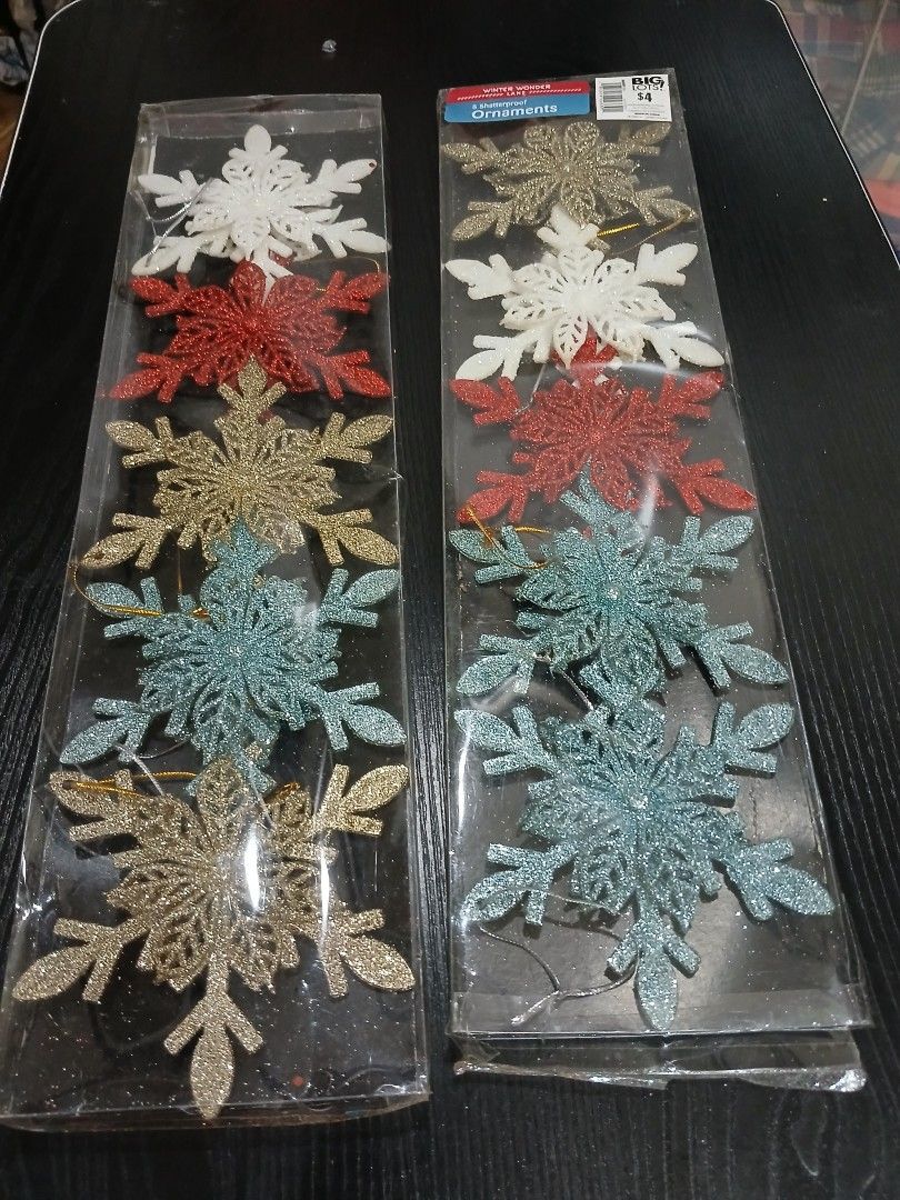 Winter Ornaments (Category: Other Home Decor) located in Davao. Submitted by ferdipt (Listing ID 1461127462, Image 1). Description: Glittery snowflake Christmas tree ornaments packaged in clear plastic sets..
