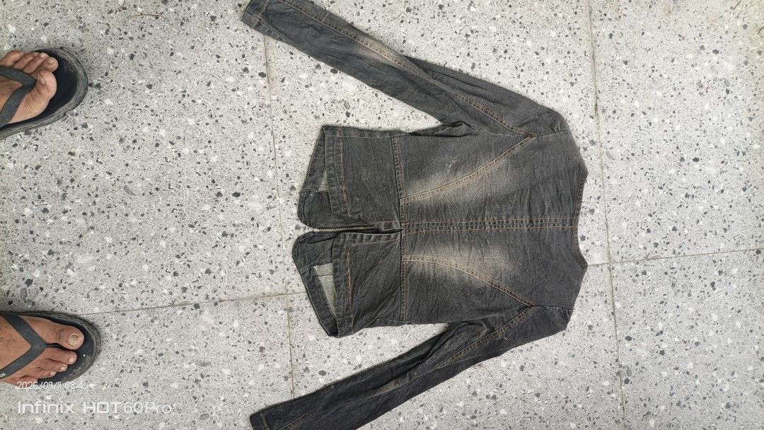 Women's Grey Denim Jacket with Lace Collar (Category: Coats, Jackets and Outerwear) located in Manila. Submitted by treblig. (Listing ID 1461240121, Image 2). Description: - Grey denim jacket - Long sleeves - Unique lace trim around the neckline - Front zipper closure - Two chest pockets - Split hem back with zipper - Ideal for layering - Pairs well with jeans or skirts.