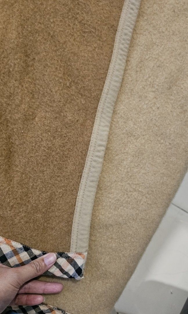 Wool Lap Blanket Beige - DAKS LONDON (Category: Bedding & Towels) located in Quezon City. Submitted by happy.cutie888 (Listing ID 1461261568, Image 3). Description: Beige lap blanket featuring the DAKS LONDON A distinctive checkered border lime Burberry. 140cm x 200cm Brand: DAKS LONDON (British Fashion) Texture: Pure Wool Color: Dual toned - Beige and Brown Design: Checkered border Product type: Lap blanket 777 negotiable price like new - I used