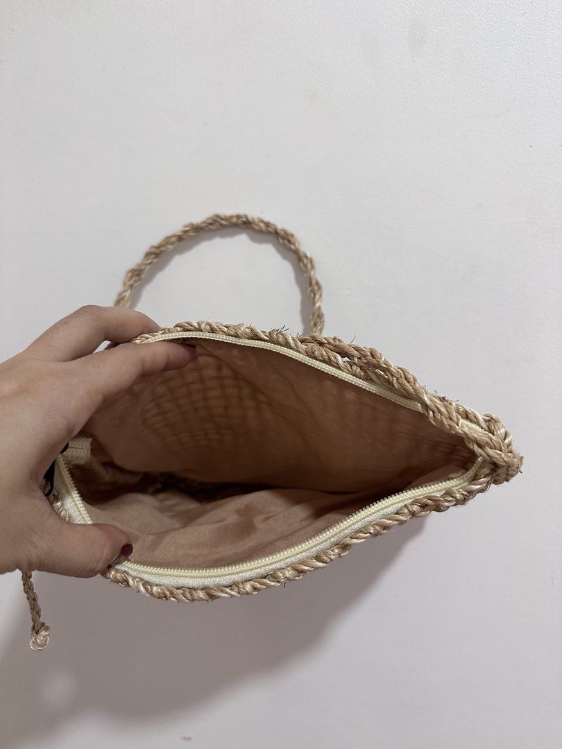 Woven Crossbody Bag (Category: Cross-body Bags) located in Binan City. Submitted by forgetmenot_ph (Listing ID 1461281844, Image 2). Description: - Cute woven crossbody bag from Club Punta Fuego - Made of natural straw - Zipper closure for security - Comfortable braided strap - Smooth fabric lining inside - Ideal for casual outings and beach trips - Approximate dimensions: 8 inches wide x 6 inches tall.