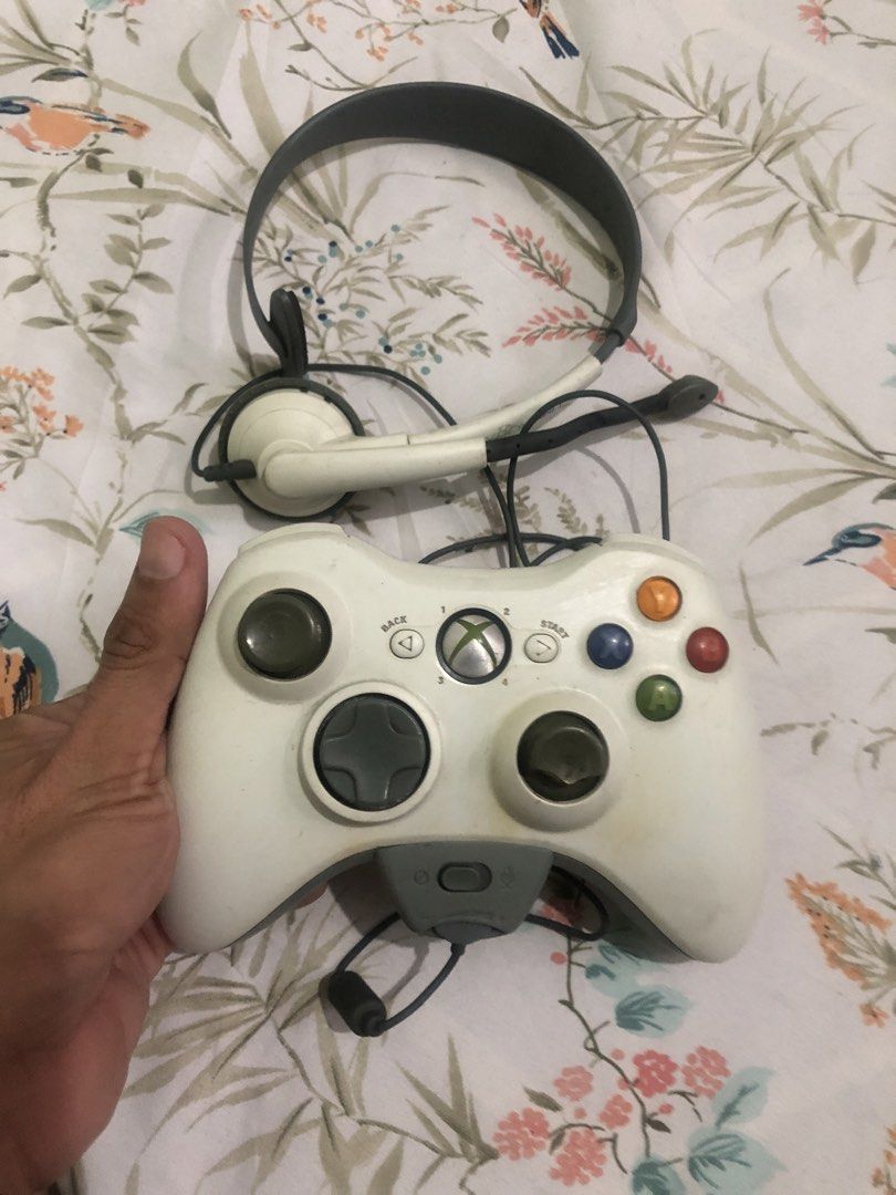 Xbox 360 wireless controller with headset (Category: Controllers) located in Quezon City. Submitted by markgolveo (Listing ID 1461162480, Image 1). Description: Xbox 360 wireless controller with headset Last tested a year ago working properly Missing its adapter wire for charging Worn out analog rubber caps Not sure if battery pack still holds up now lost its charging cable Mic last tested working , mic cable flimsy, missing earfoam Signs of wear