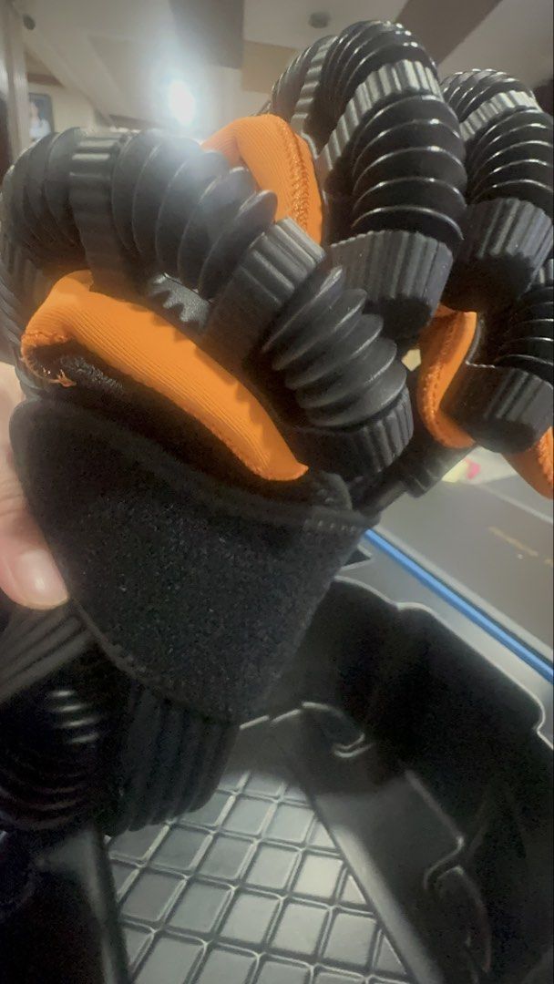 XiangAi Robot Training Glove (Category: Medical Supplies & Tools) located in Quezon City. Submitted by nhamaq (Listing ID 1461248814, Image 2). Description: - XiangAi Robot Training Glove set (LEFT HAND) - Includes: Glove with flexible finger tubing, control unit with buttons and display, small orange ball - All items are in the original box - Ideal for rehabilitation or training purposes.