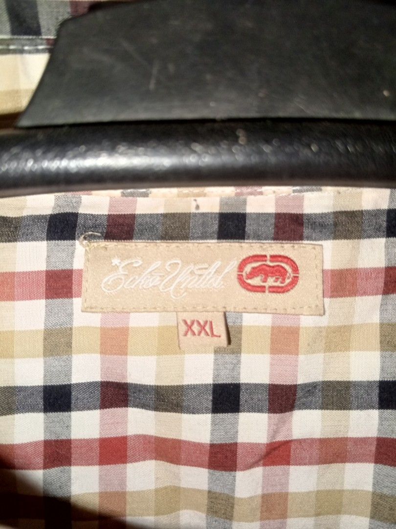 Y2K Ecko Unltd Plaid Button Up Polo (Category: Tshirts & Polo Shirts ) located in Marilao. Submitted by mosdefwji (Listing ID 1461169445, Image 3). Description: Vintage Ecko Unltd Plaid Button Up Polo Brand New/Pristine Condition • Actual Measurements: Width: 26 inches ( pit to pit ) Length: 33 inches Honest Issue: none Location: Marilao Bulacan MOD: J&T Express Or Lalamove ( I can ship nationwide wide ) MOP: Gcash Only Strictly NO COD.