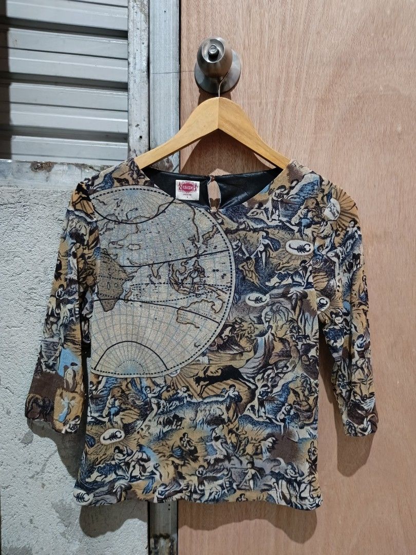 Y2k graphic mesh top (Category: Longsleeves) located in Davao. Submitted by mln-boutique (Listing ID 1461185399, Image 1). Description: size - m good condition.