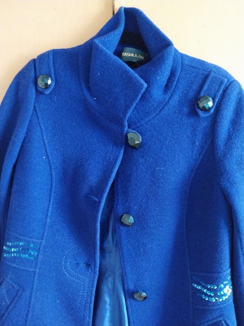 YASHULLAN Blue Wool Blend Coat with Sequins and Gem Buttons (Category: Coats, Jackets and Outerwear) located in Cavite. Submitted by angelistuff (Listing ID 1461130675, Image 2). Description: - Blue wool blend coat from YASHULLAN - Eye-catching sparkly sequin details on pockets and sleeves - Unique dark gem-like buttons down the front - Fully lined for extra warmth - Ideal for cooler weather, offering both style and coziness.