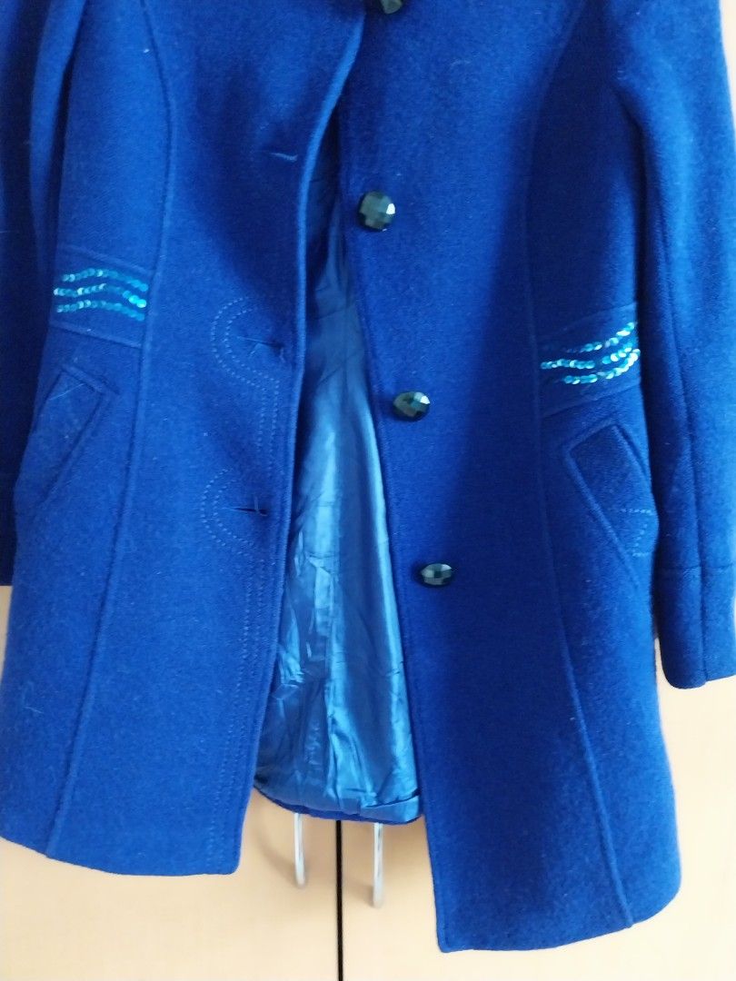 YASHULLAN Blue Wool Blend Coat with Sequins and Gem Buttons (Category: Coats, Jackets and Outerwear) located in Cavite. Submitted by angelistuff (Listing ID 1461130675, Image 3). Description: - Blue wool blend coat from YASHULLAN - Eye-catching sparkly sequin details on pockets and sleeves - Unique dark gem-like buttons down the front - Fully lined for extra warmth - Ideal for cooler weather, offering both style and coziness.