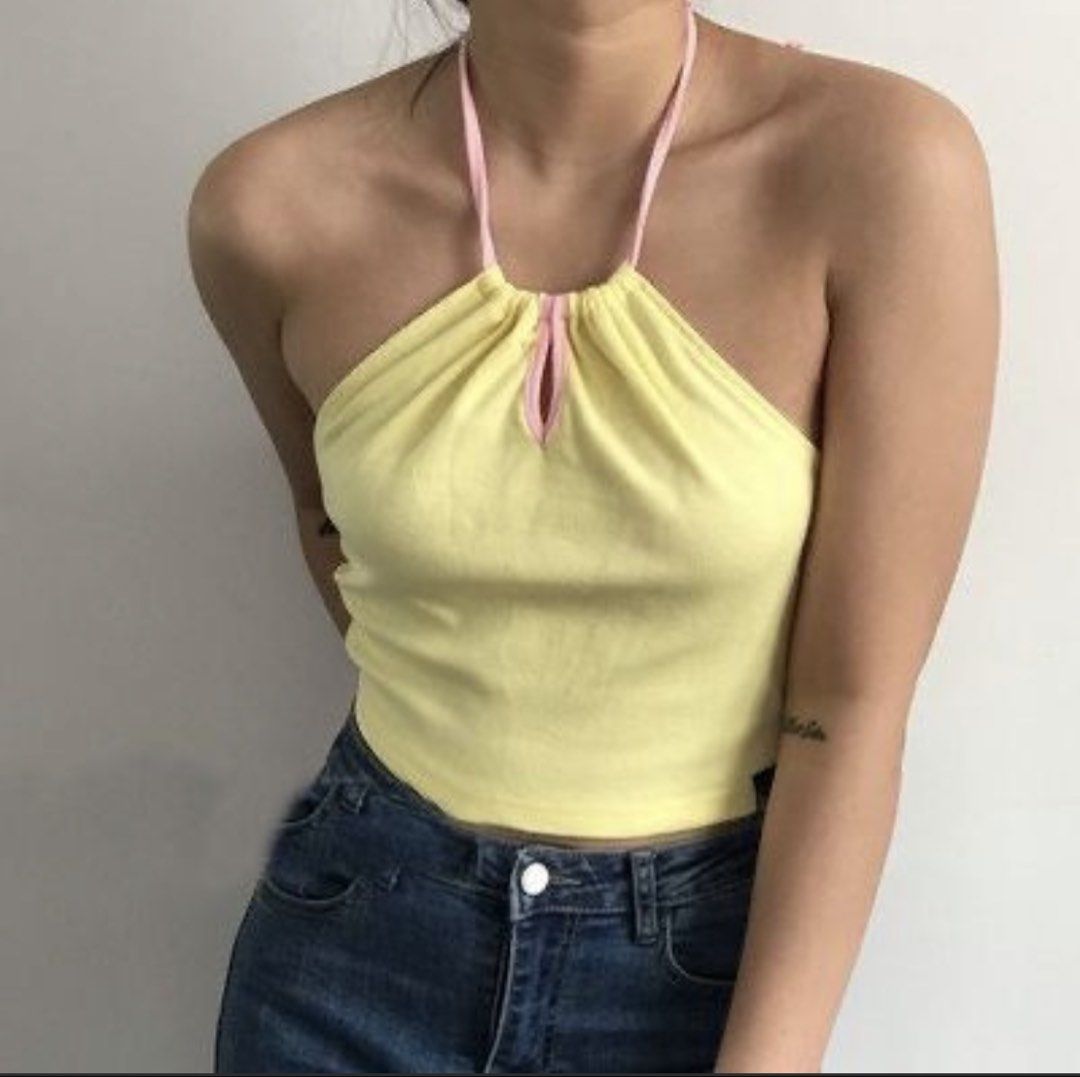 Yellow Halter Top with Pink Trim (Category: Sleeveless) located in Paranaque City. Submitted by marengkondo23 (Listing ID 1461297224, Image 1). Description: - cute yellow halter top.