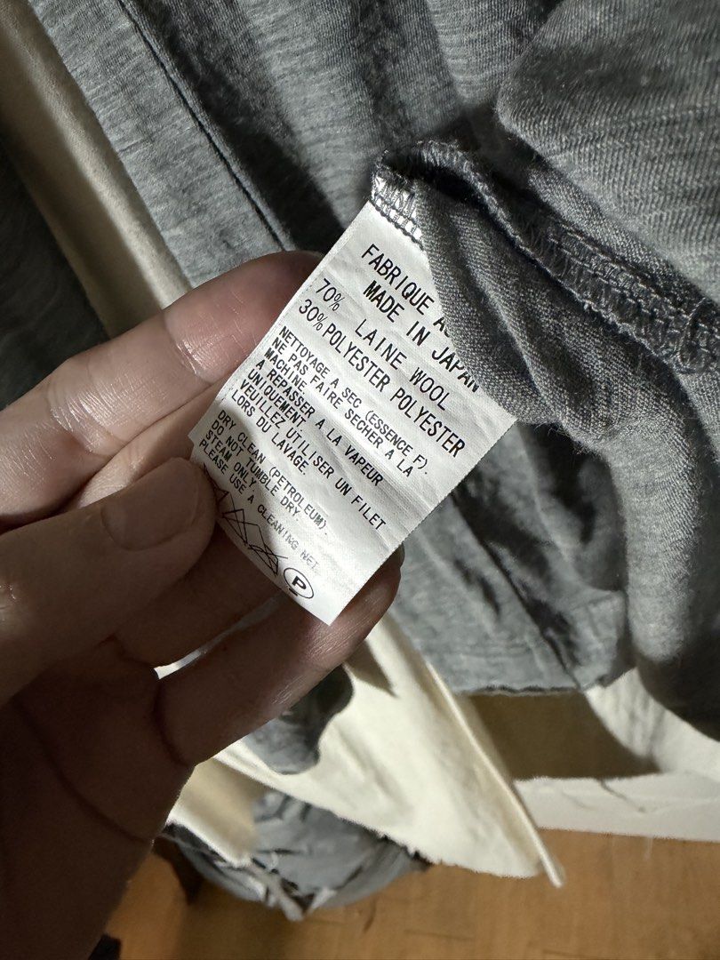 Y's Long Sleeve Wool Blend Shirt Grey (Category: Longsleeves) located in Mandaluyong City. Submitted by jellyace777 (Listing ID 1461139855, Image 3). Description: - Brand: Y's - Material: 70% Wool, 30% Polyester - Condition: Small pinhole on shoulder area (please refer to the last photo) - Features: Great for layering - Stretchy fabric L - 30 W - 17 Sleeve Length - 29.