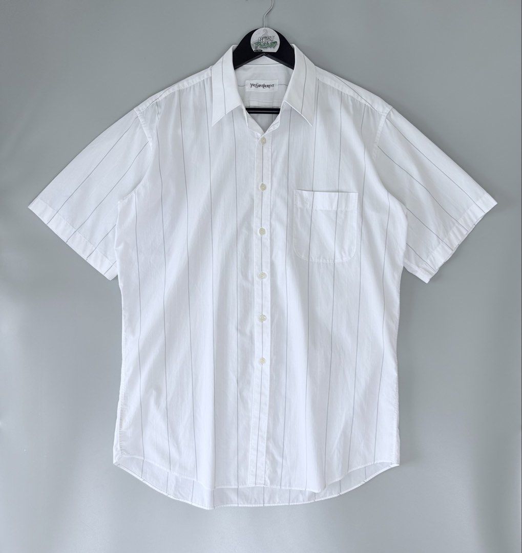 Yves Saint Laurent Polo stripe (Category: Formal Shirts) located in Cebu City. Submitted by bestpicked (Listing ID 1461283340, Image 1). Description: Authentic Excellent condition Size 40 on tag Width 22inches Length 28-30 (long back) Best fit large No issue Location - Guadalupe Cebu City.
