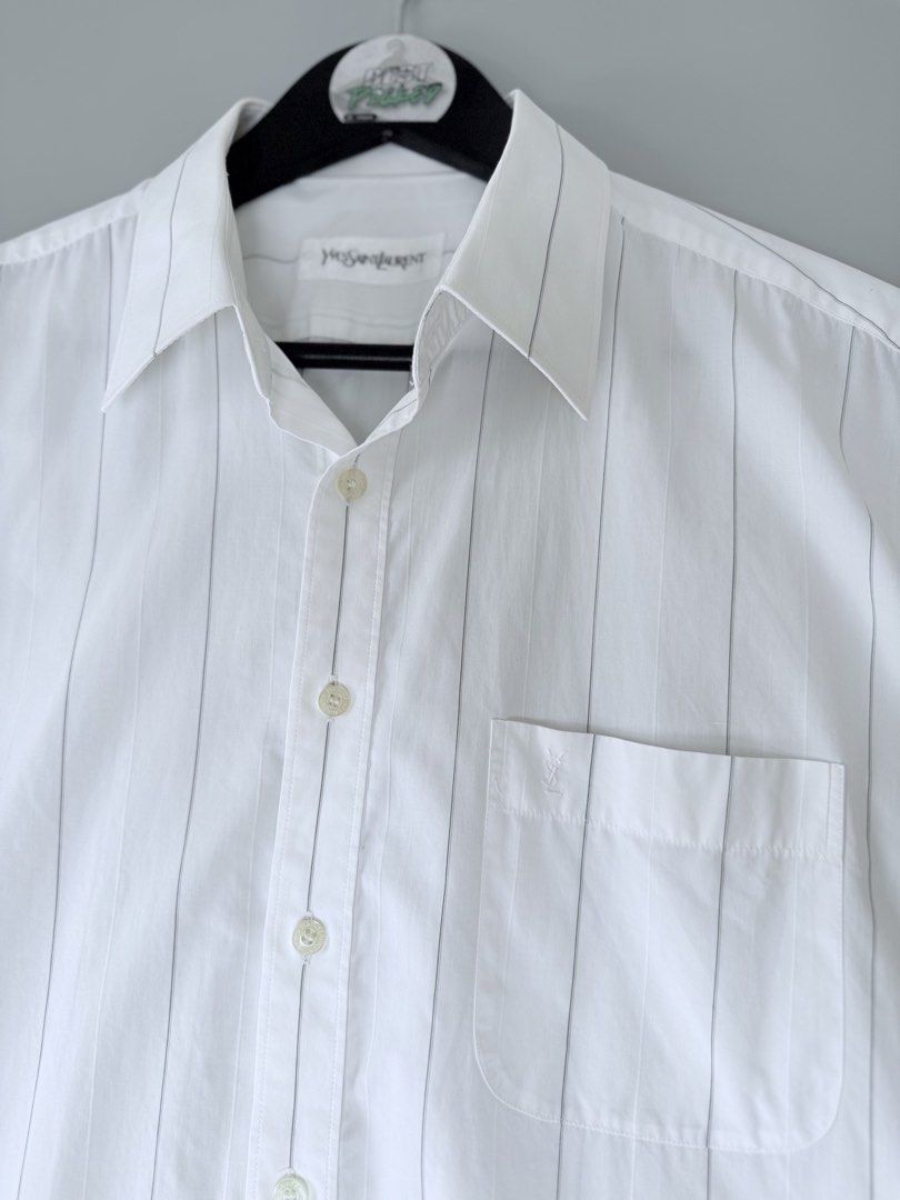 Yves Saint Laurent Polo stripe (Category: Formal Shirts) located in Cebu City. Submitted by bestpicked (Listing ID 1461283340, Image 3). Description: Authentic Excellent condition Size 40 on tag Width 22inches Length 28-30 (long back) Best fit large No issue Location - Guadalupe Cebu City.