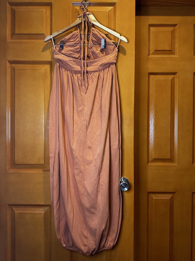 Zara Balloon Dress Muted Orange Halter Backless Adjustable Strap (Category: Dresses) located in Angeles City. Submitted by luxenstuff (Listing ID 1461229104, Image 2). Description: - Zara Balloon Dress - Size: Medium (M) Armpit to armpit can fir up to 30in - Color: Muted Orange - Neckline: Halter - Design: Backless - Features: Adjustable straps for a perfect fit - Length: 46 inches or longer - Origin: Made in Turkey 10/10 kept unused.