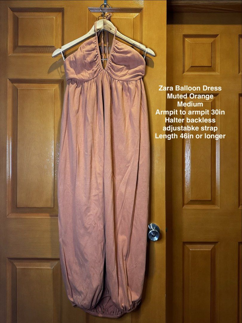 Zara Balloon Dress Muted Orange Halter Backless Adjustable Strap (Category: Dresses) located in Angeles City. Submitted by luxenstuff (Listing ID 1461229104, Image 1). Description: - Zara Balloon Dress - Size: Medium (M) Armpit to armpit can fir up to 30in - Color: Muted Orange - Neckline: Halter - Design: Backless - Features: Adjustable straps for a perfect fit - Length: 46 inches or longer - Origin: Made in Turkey 10/10 kept unused.