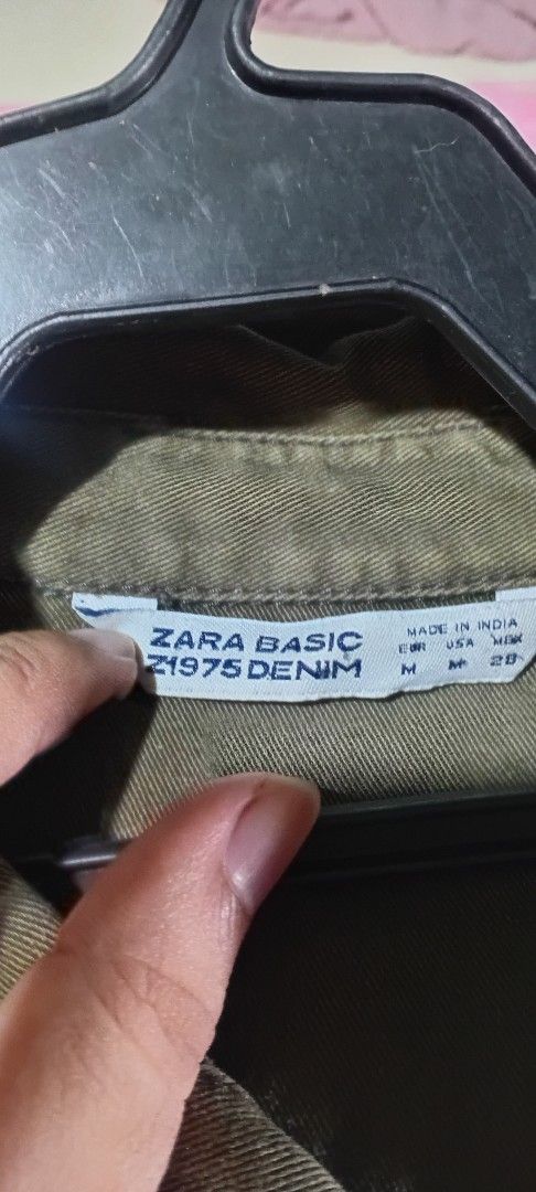 Zara Basic Denim Jacket with Patches (Category: Coats, Jackets and Outerwear) located in Manila. Submitted by luckywater.99ce4e (Listing ID 1461160577, Image 2). Description: - Zara Basic olive green denim jacket - Size: Medium (M) - Two chest pockets - Button closure - Embroidered patches on chest ISSUE-may maliit na dot white stain sa may bandang baba.