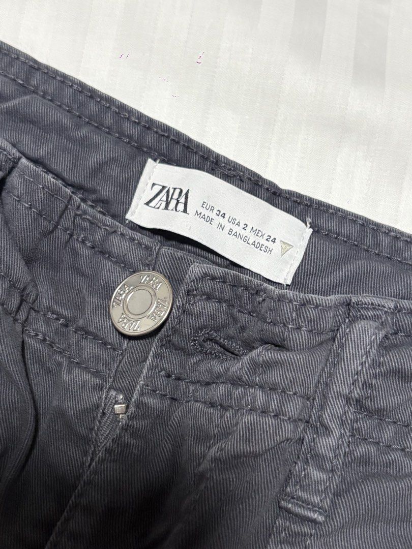 ZARA Cargo Pants Grey Size 34/2/24 (Category: Other Bottoms) located in Pasay City. Submitted by nicoletlntn_ (Listing ID 1461227521, Image 2). Description: - Zara Grey Cargo Pants - Straight leg fit - Multiple functional pockets - Button and zip fly closure - Made in Bangladesh - Ideal for everyday casual wear.